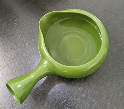 Japanese yuzamashi cooling vessel filled with hot water