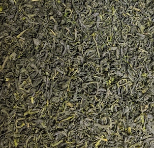 Curled leaves of Japanese kamairicha pan-fired green tea